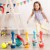 Dziecko turlające kulę do kręgli B.Toys Let’s Go Bowling